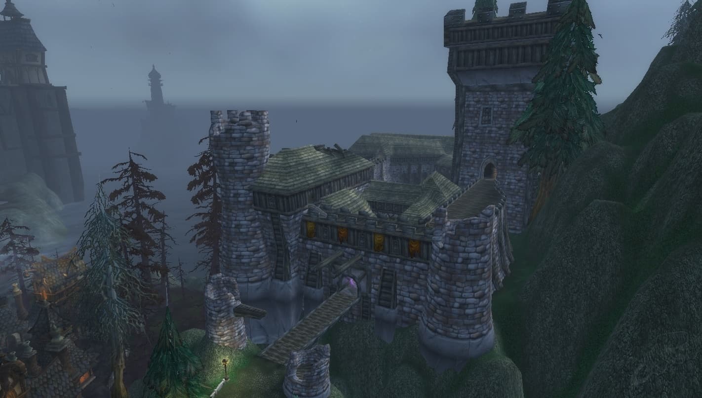 The grey walls of Shadowfang Keep in the mist